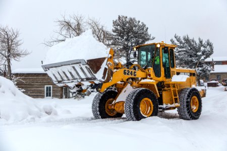 Clearing snow away in Mammoth with a front-end loader (3) photo