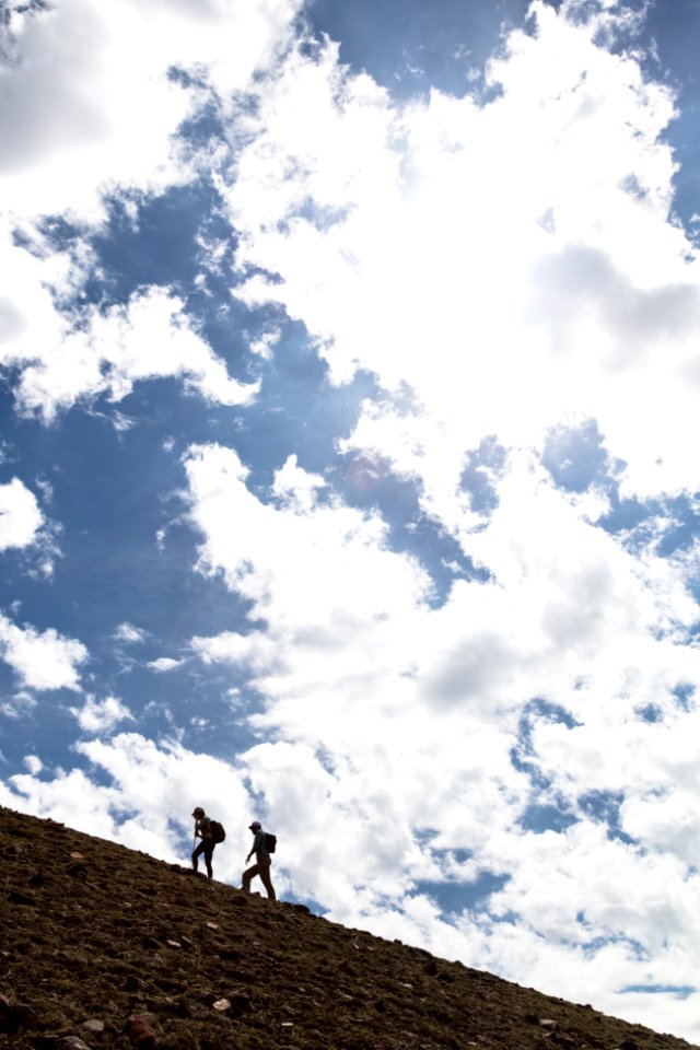 Hikers climb a ridge in Lamar Valley photo