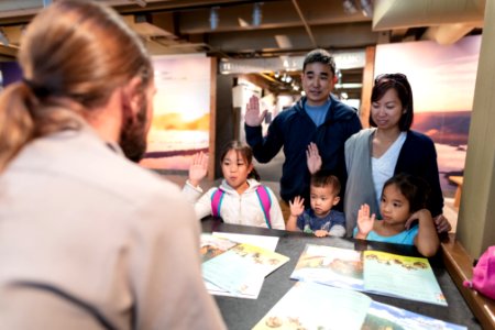 Junior Ranger family at Canyon Visitor Education Center photo