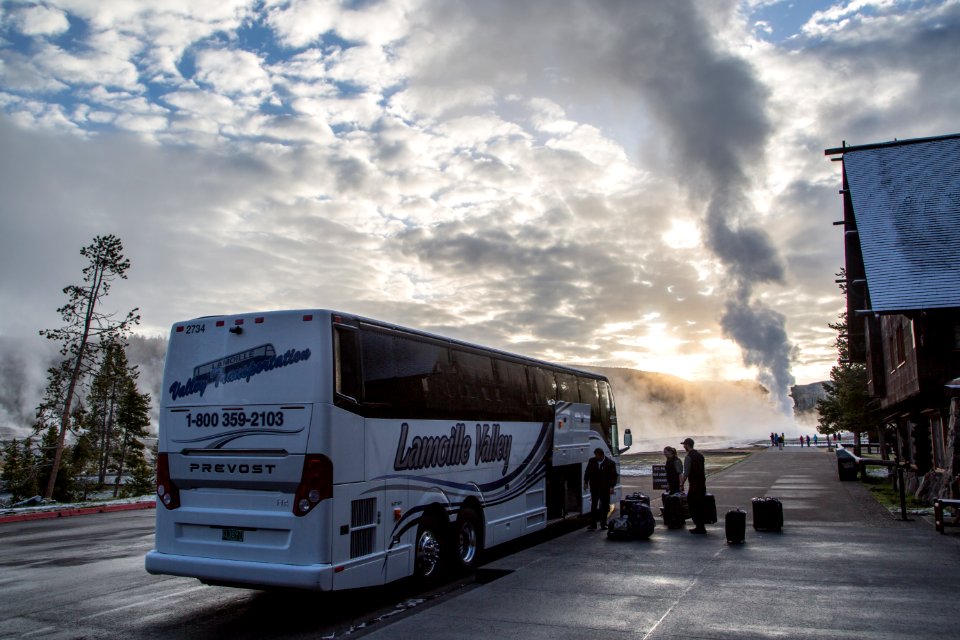 Loading a bus at the Old Faithful Inn