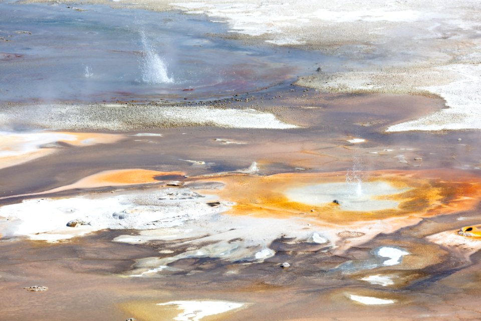 Erupting geysers in Porcelain Basin