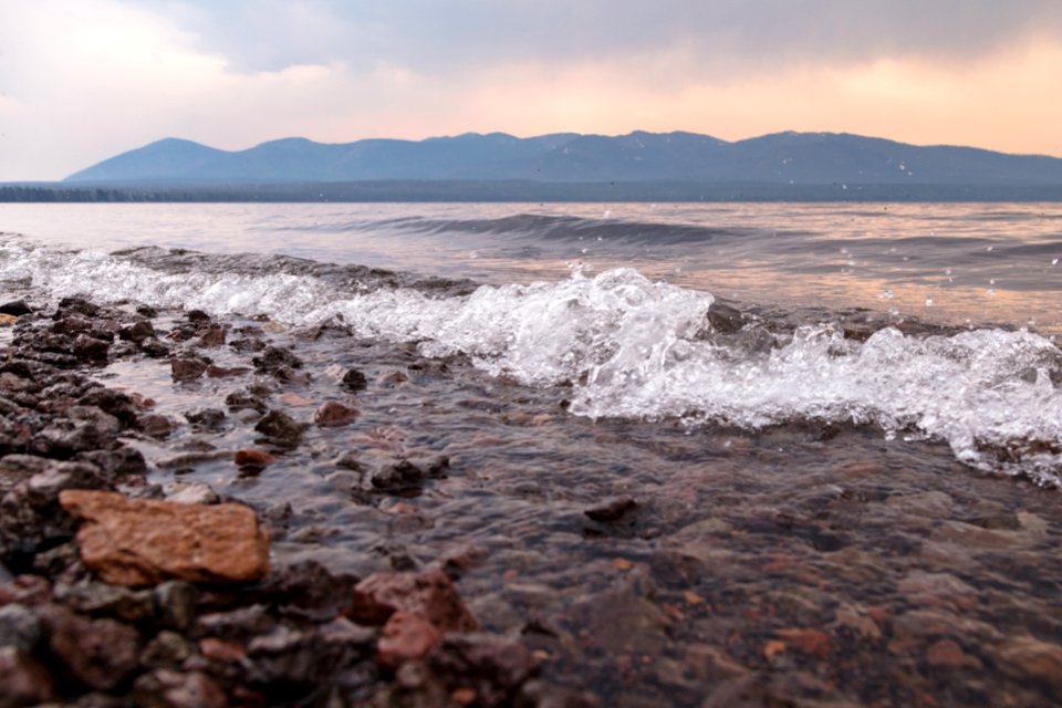 Lewis Lake and Red Mountains on a hazy afternoon