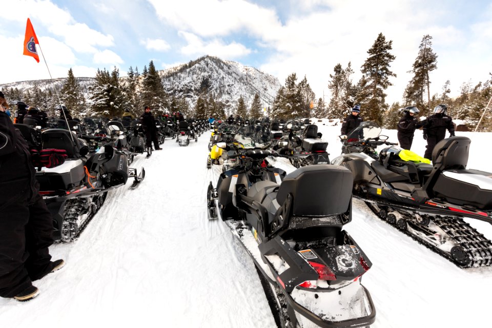 Snowmobiles parked at the Madison Warming Hut