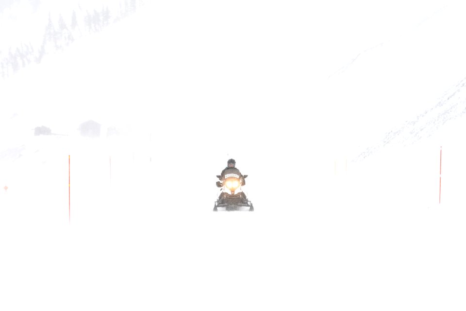 Non-commercial snowmobiel rider on Sylvan Pass
