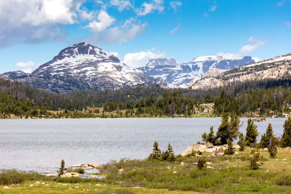 Lonesome Mountain rises behind Floating Island Lake