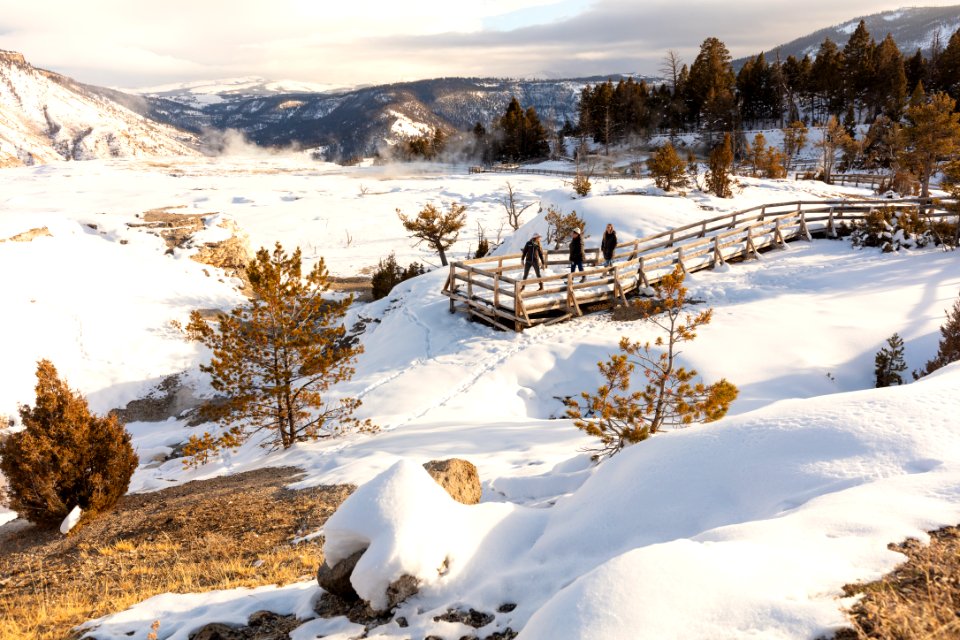 Exploring boardwalks at Mammoth Hot Springs during winter