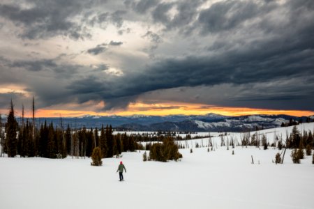 Snowshoeing back to camp at sunset on the Buffalo Plateau Trail photo