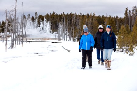 Group heads back to the car along the boardwalks at Fountain Paint Pots Trail in winter (2)