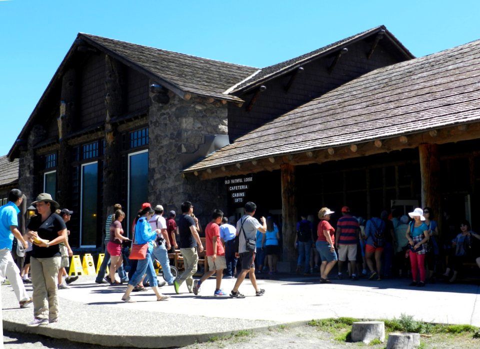 Old Faithful Lodge, visitor walking in front of building