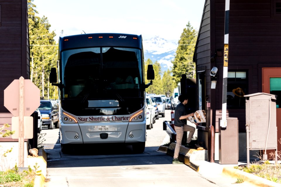 Commercial tour bus at West Entrance photo