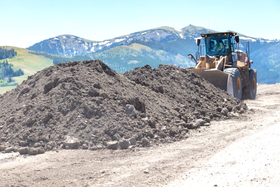 Tower to Chittenden Road Project: Hauling material on Dunraven Road photo