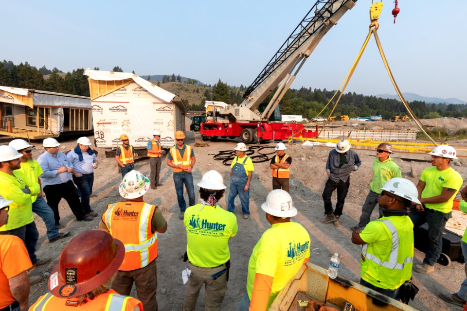 YACC Camp Housing Project: safety talk before setting the first new house