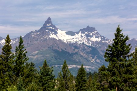 Pilot and Index Peaks framed by trees photo