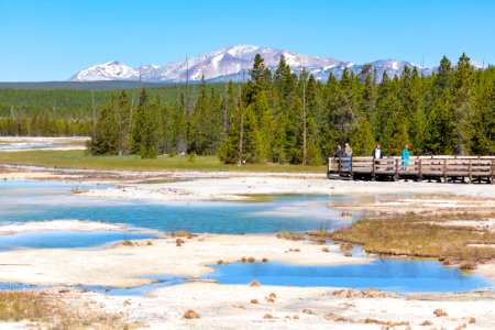 People take in the view of Crackling Lake from the boarkwalk