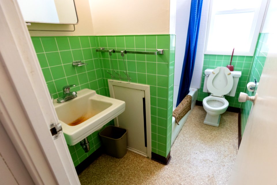 Seasonal employee housing bathroom before renovation