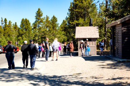 People waiting to use the restroom at Midway Geyser Basin parking area (2) photo