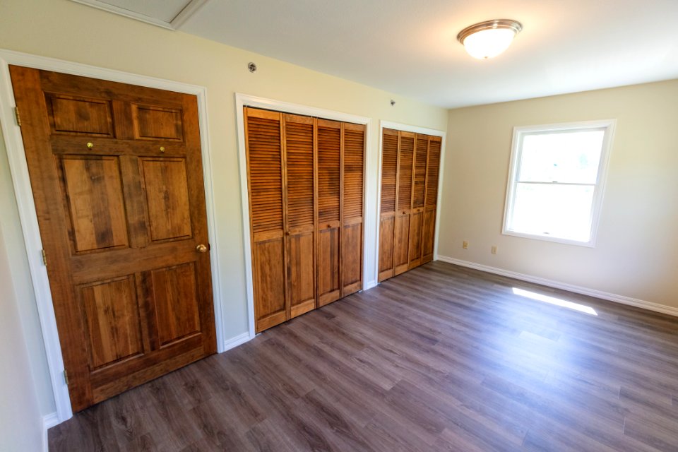 Updated master bedroom of non-historic employee housing