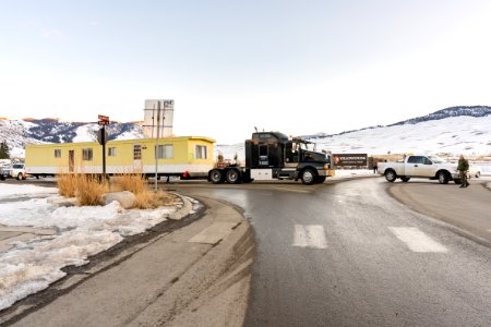 Outdated employee housing trailer leaving Yellowstone at the North Entrance