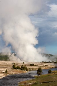Steam from Excelsior Geyser Crater on a spring morning photo