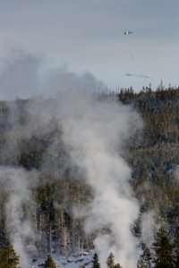 Subsurface survey helicopter flies near the Upper Geyser Basin