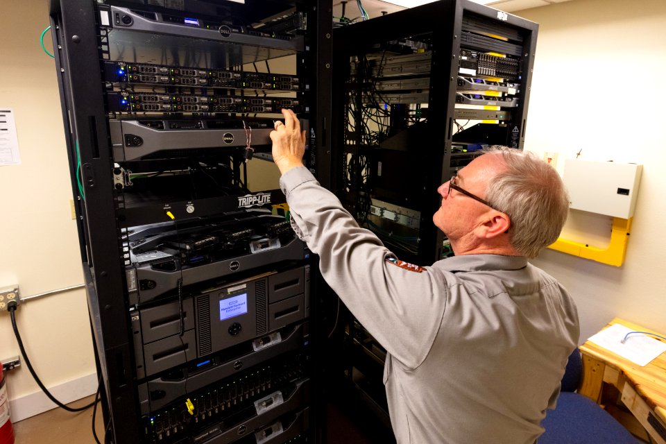 Park IT specialist checking on park servers