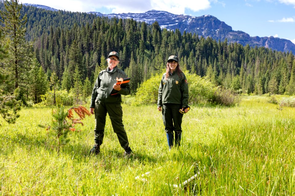 Wetland ecologists, Elizabeth and Rachel, collect data from a wetland quadrat along the road near the Northeast Entrance (2)