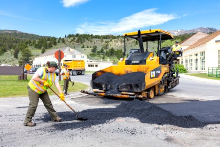 Special projects crew repair the road surface at the Mammoth three-way intersection (5)