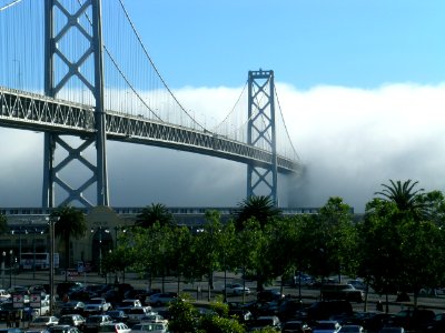 bay bridge engulfed in fog photo
