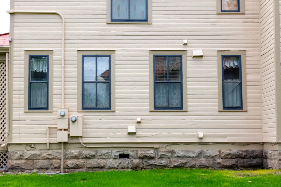 Historic housing exterior comparisons: fresh paint detailed side view