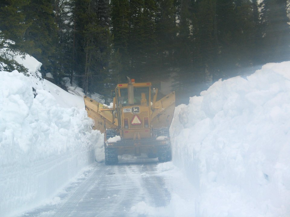 Brett Athas in the Wedge Grader on East Entrance Road