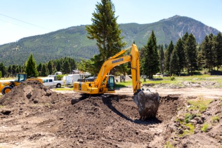 YACC Camp Housing Project: Excavating sites for foundations