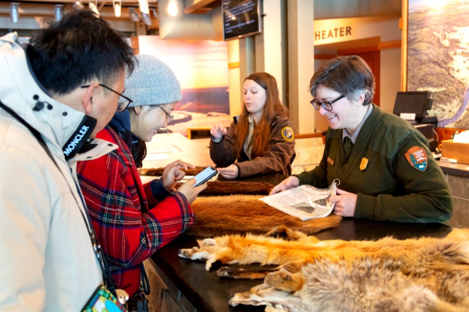 Ranger Stephanie shows off some animal pelts