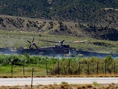 Helicopter drawing water.