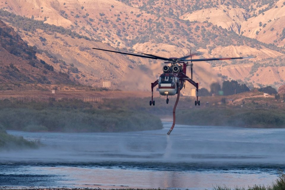 Helitanker lifts from the Colorado River