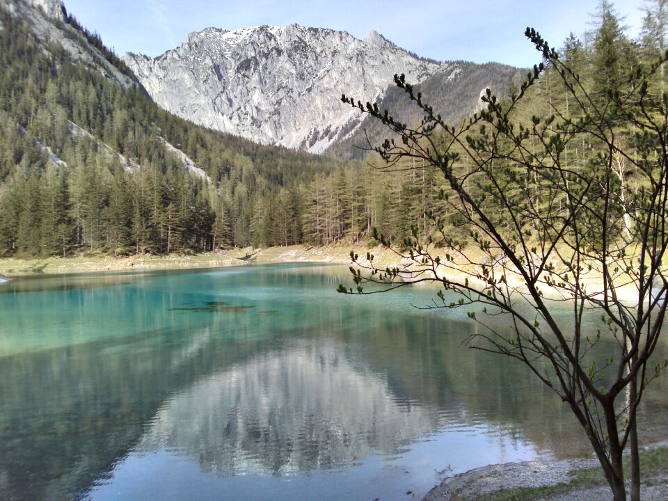 Water mirroring mountain