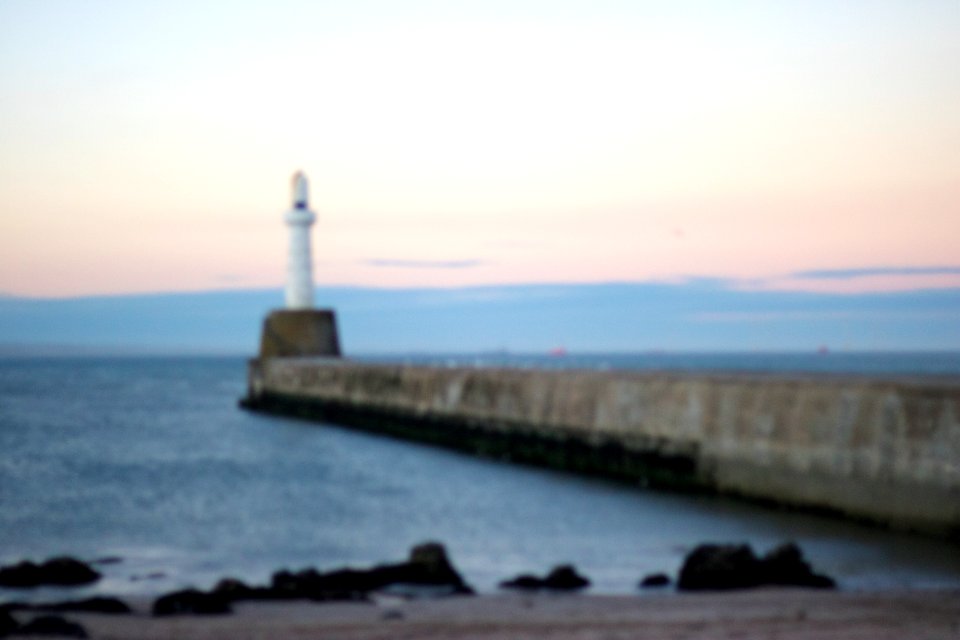 Out of focus shot of Lighthouse at Dusk
