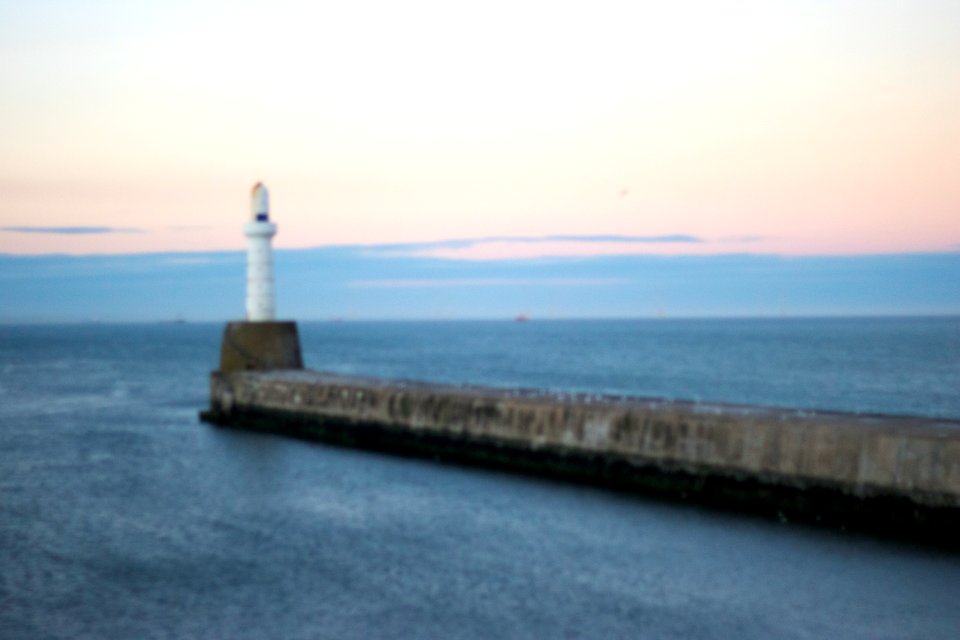 Out of focus shot of Lighthouse at Dusk