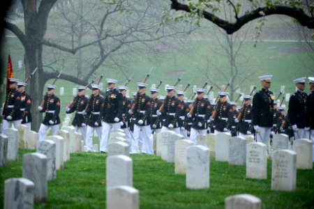 The graveside service for John Glenn takes place in Arlington National Cemetery photo