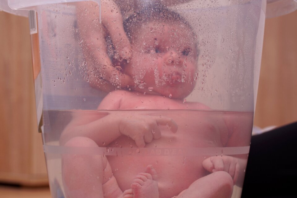 Baby infant taking bath