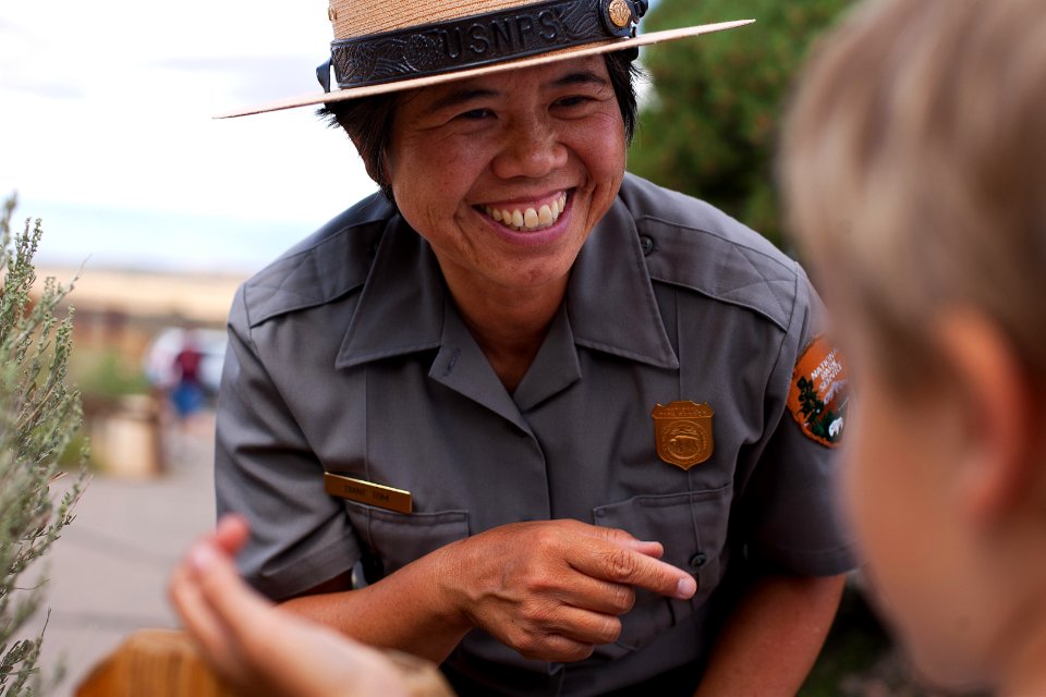Diane Tom talks with a junior ranger.