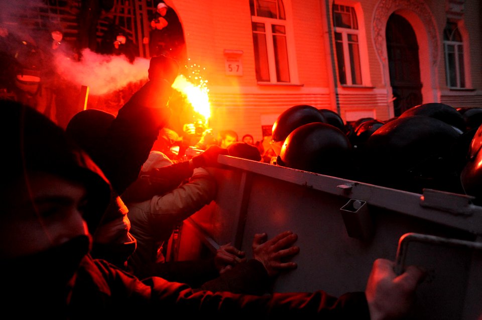 Soldiers of Ukraine's Internal Troops in riot gear and protesters clash at Bankova str, Kiev, Ukraine. December 1, 2013.-2