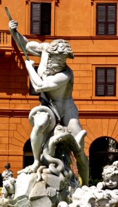 Piazza Navona: fishing man sculpture photo