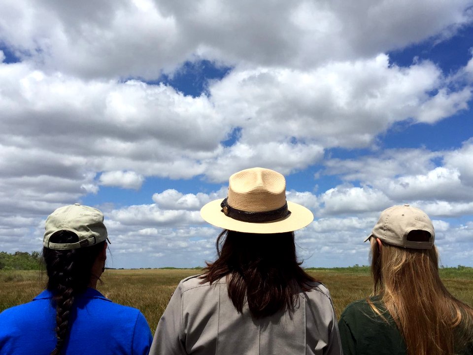 A Park Ranger, Student Conservation Association Intern, and Greening Youth Foundation Intern
