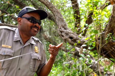 Ranger Tony points at a spider
