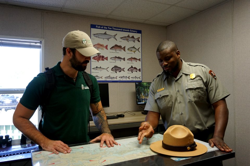 Ranger Wellington orienting a visitor