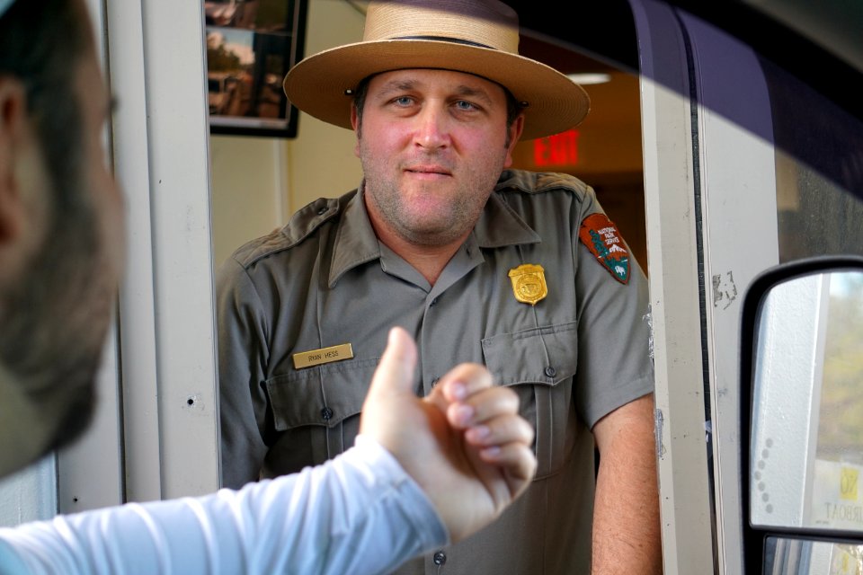 Fee Collection Ranger at Entrance Station