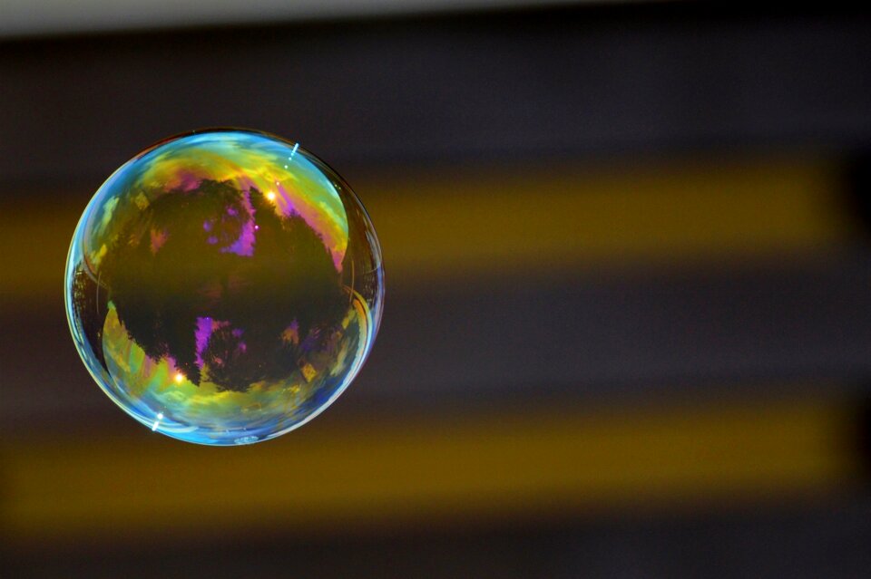 Soapy water make soap bubbles float