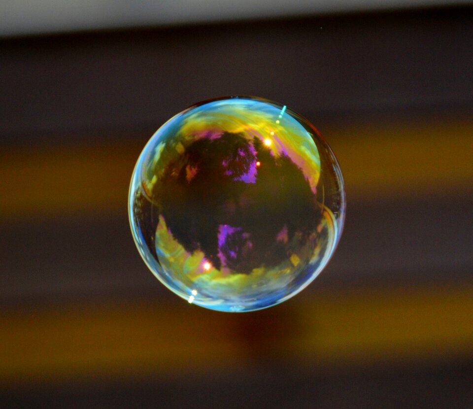 Soapy water make soap bubbles float