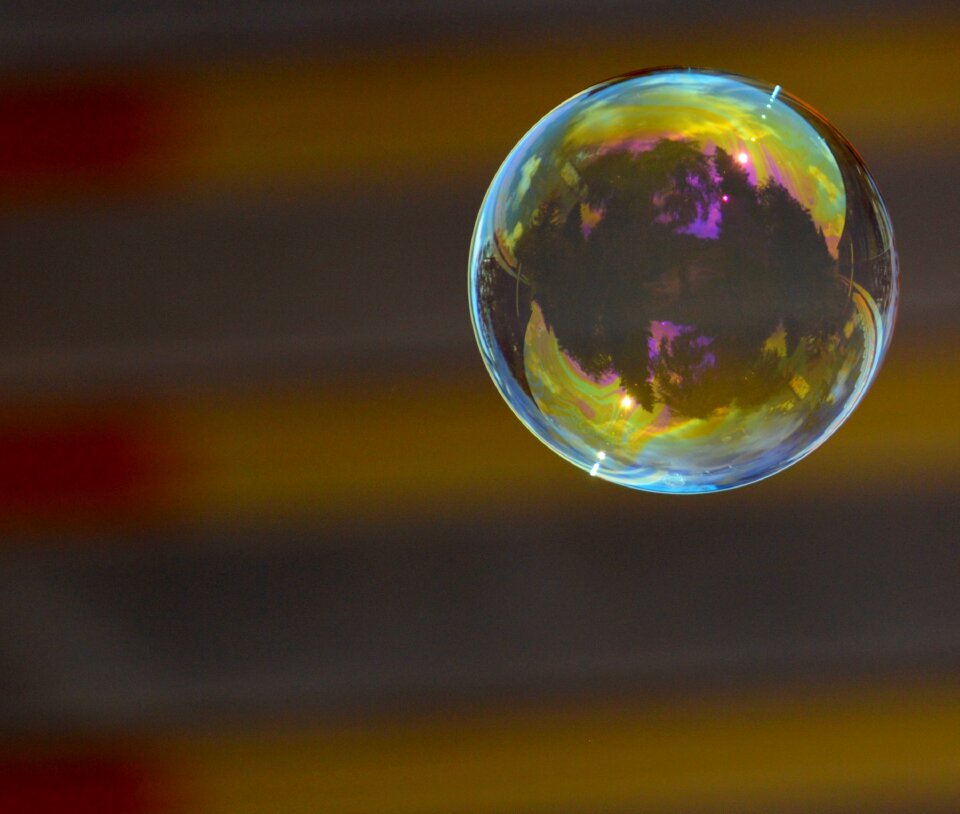 Soapy water make soap bubbles float