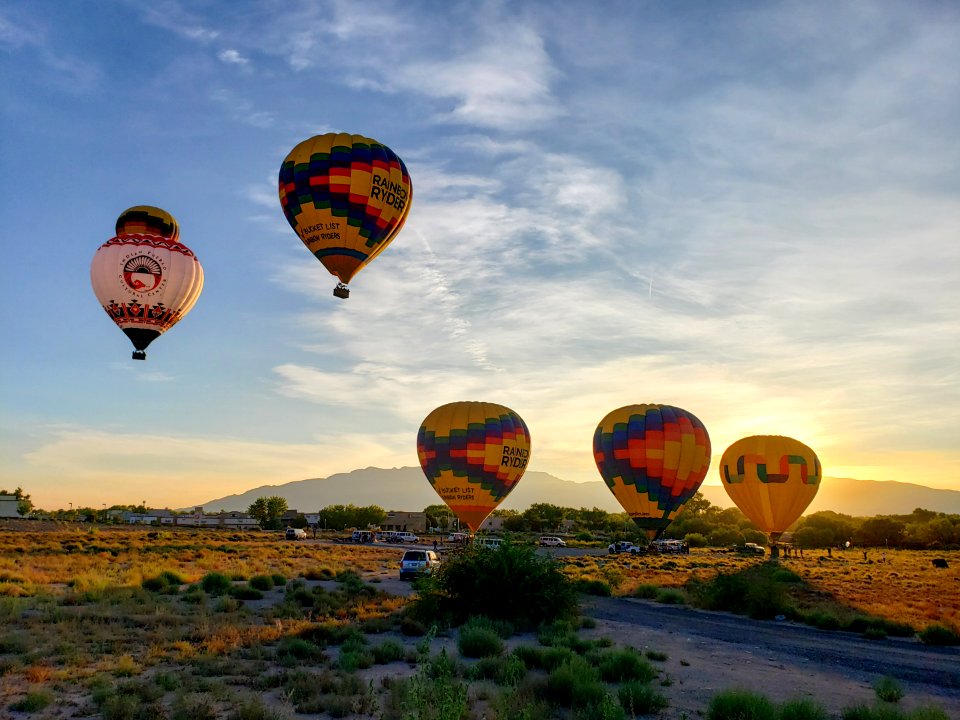 hot air balloons lifting off